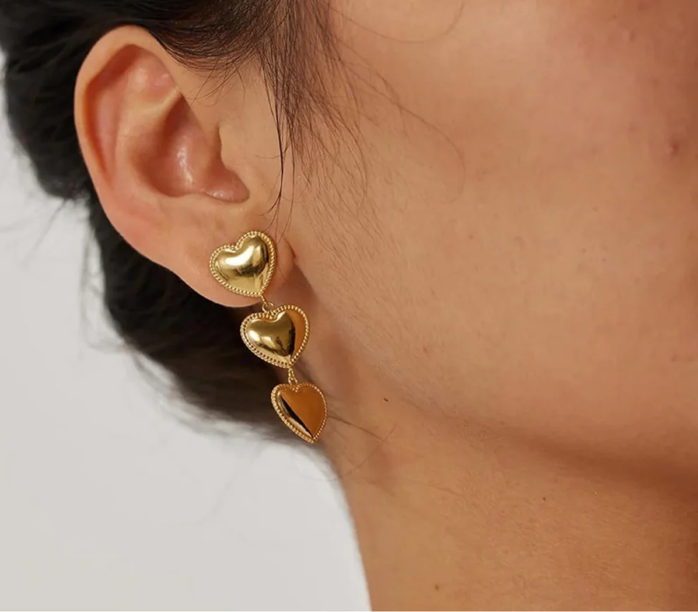 Boucles d'oreilles pendantes à trois cœurs