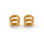 Pendientes ear cuff triples de Rouse Doree en tono dorado con diseño de aros superpuestos sin necesidad de perforación