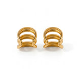 Pendientes ear cuff triples de Rouse Doree en tono dorado con diseño de aros superpuestos sin necesidad de perforación