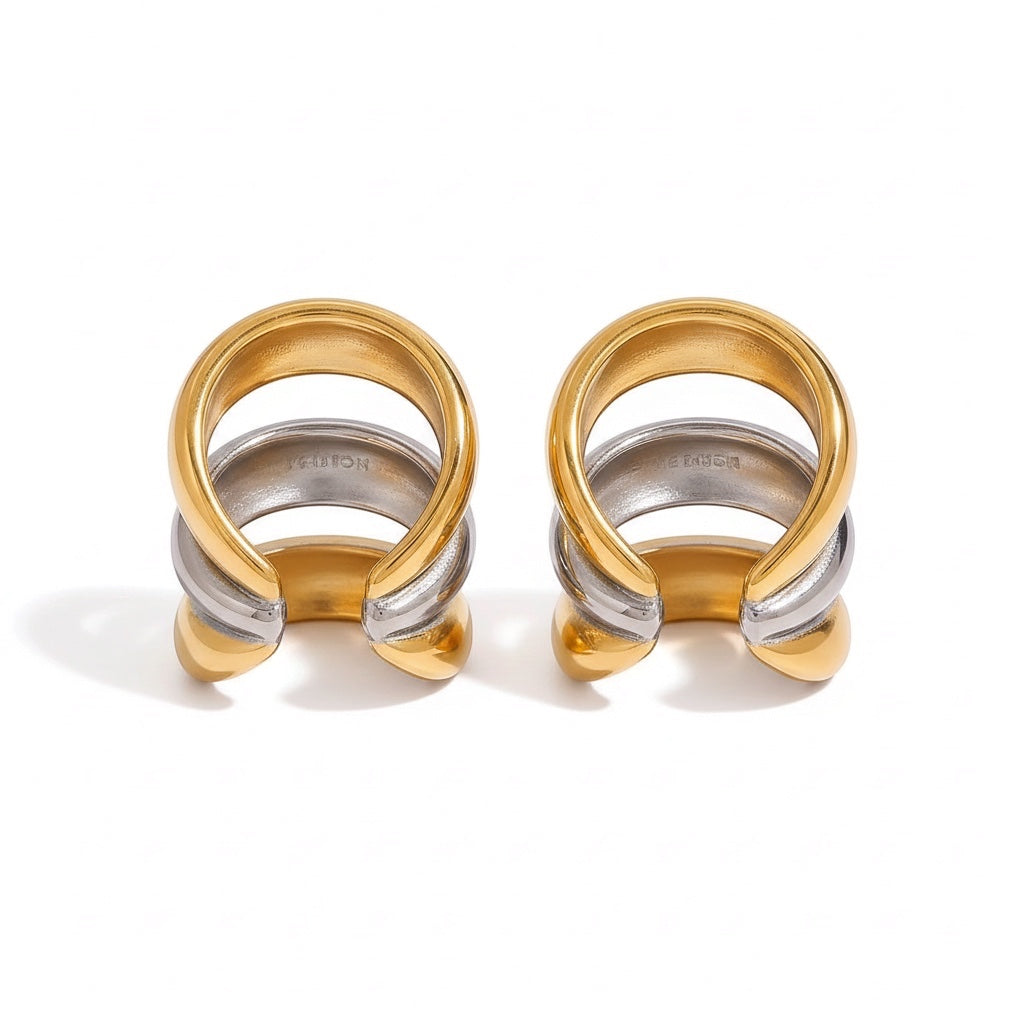 Ear cuffs Rouse Doree de diseño triple en tonos oro y plata con acabado metálico brillante y estilo moderno