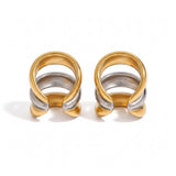 Ear cuffs Rouse Doree de diseño triple en tonos oro y plata con acabado metálico brillante y estilo moderno