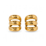 Pendientes ear cuff triples de Rouse Doree en metal dorado con diseño de aros apilados sin necesidad de perforación.